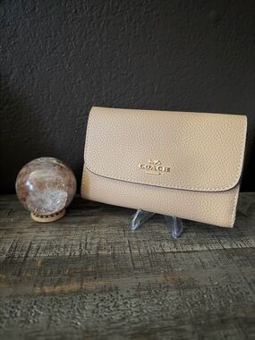 Coach Pebbled Leather Wallet in Beige